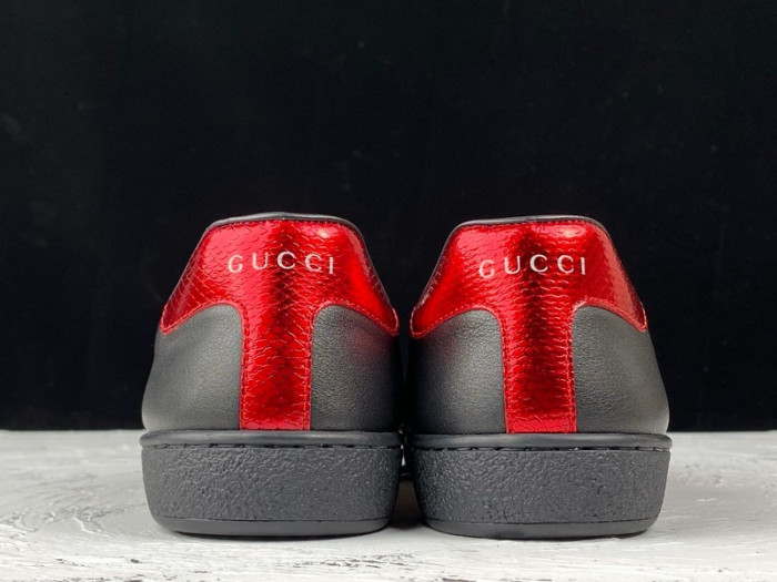 gu ace embroidered low-top sneaker