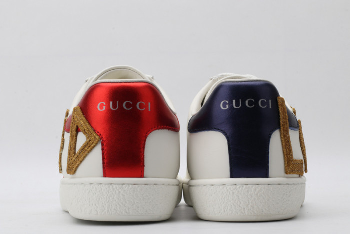 gu ace embroidered low-top sneaker