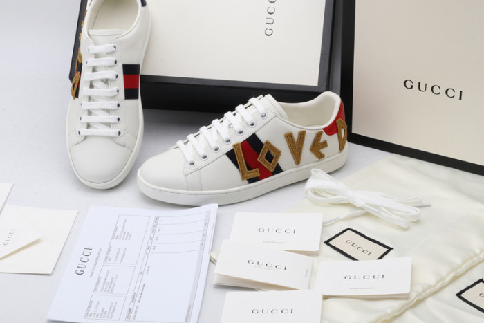gu ace embroidered low-top sneaker