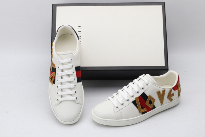 gu ace embroidered low-top sneaker