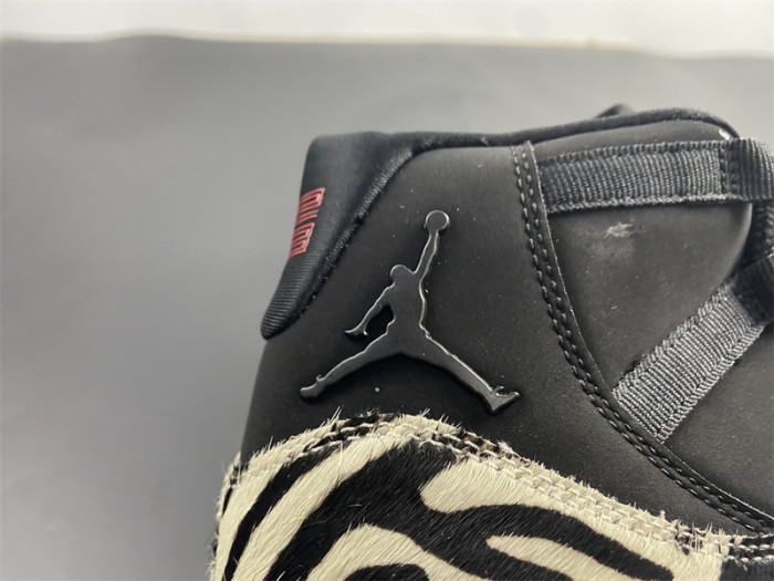 air jordan 11 “animal instinct” black / red / sail / white ar0715-010