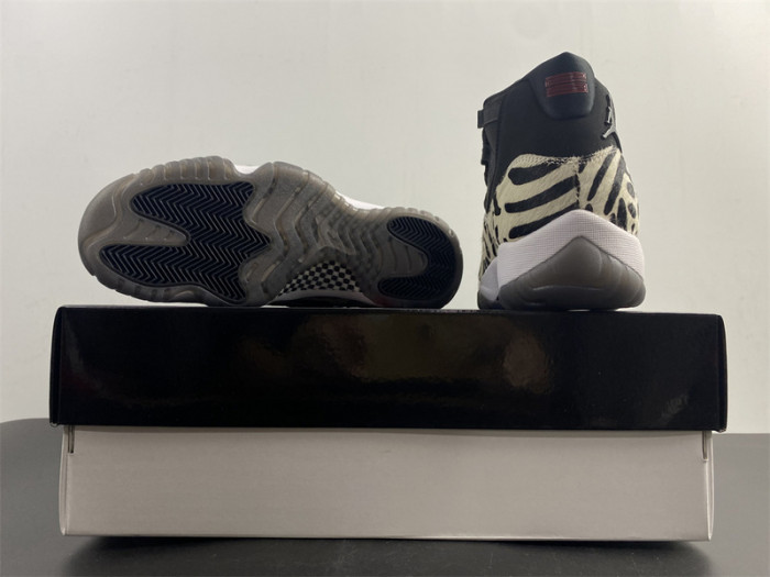air jordan 11 “animal instinct” black / red / sail / white ar0715-010