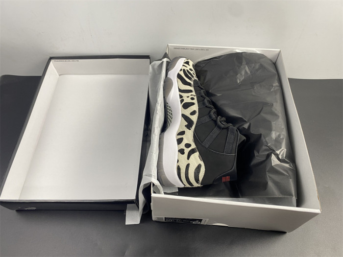 air jordan 11 “animal instinct” black / red / sail / white ar0715-010
