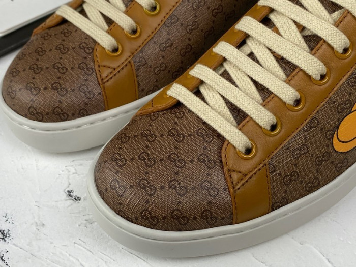 gu ace embroidered low-top sneaker