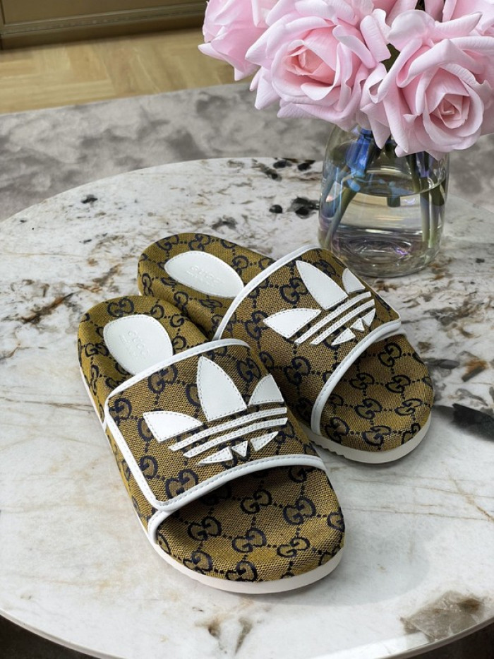 gu x a*d*das sandal