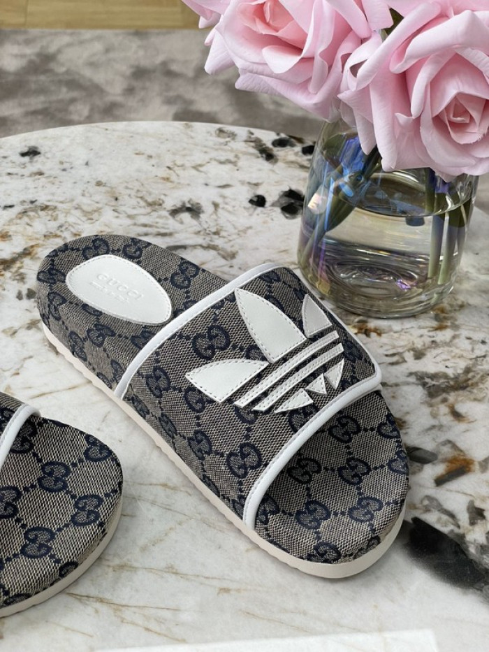 gu x a*d*das sandal