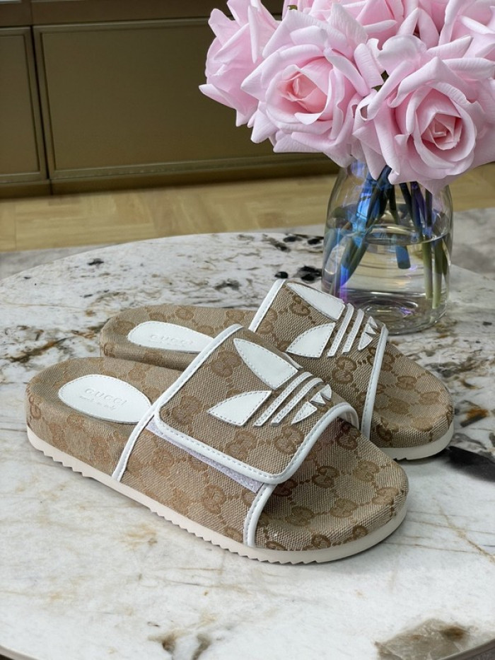 gu x a*d*das sandal