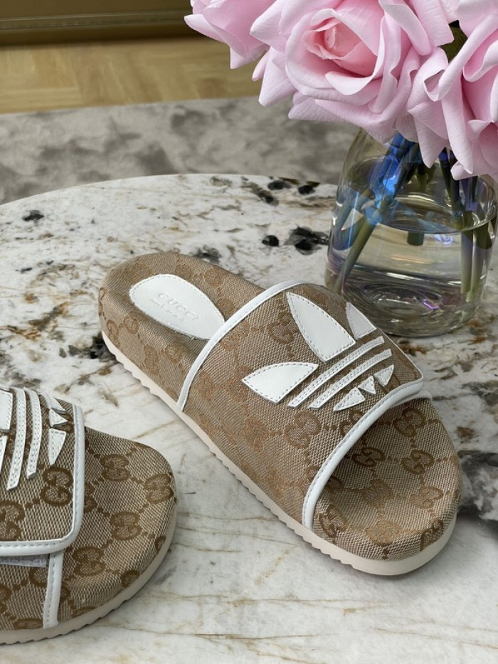 gu x a*d*das sandal