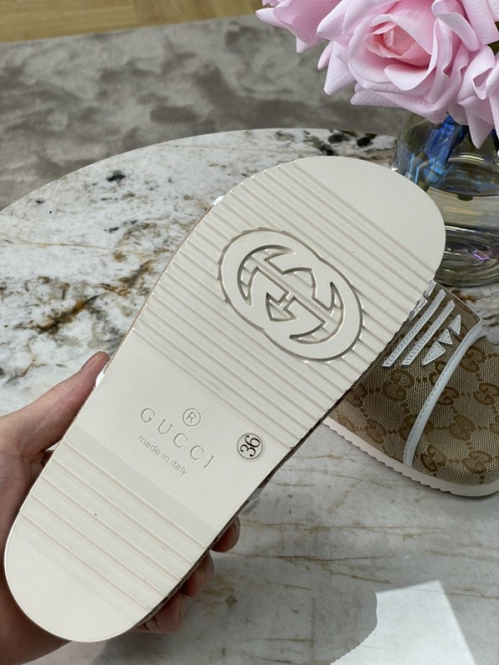 gu x a*d*das sandal