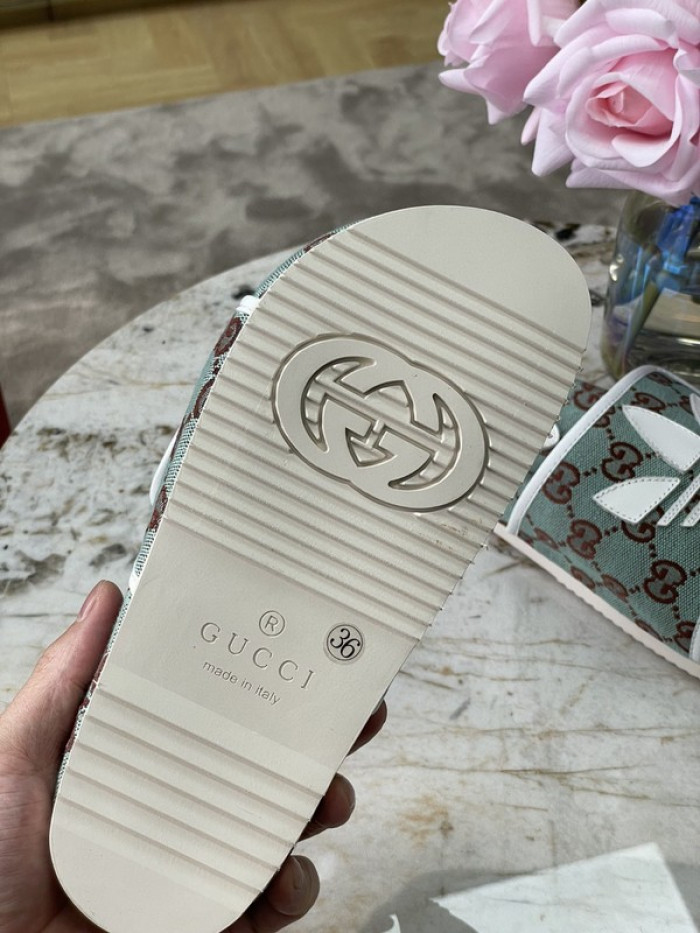 gu x a*d*das sandal