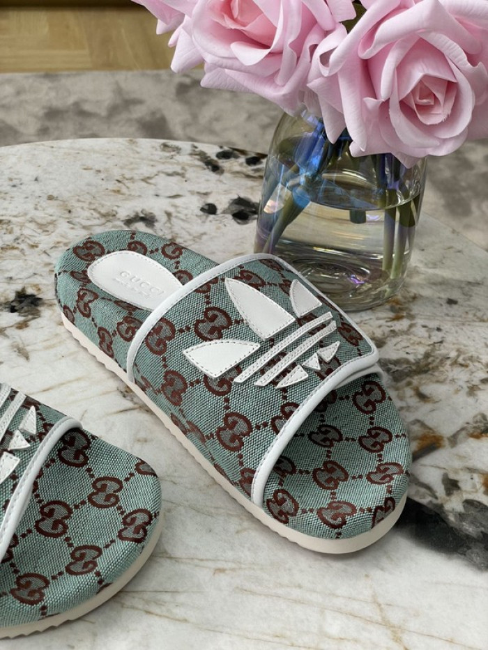 gu x a*d*das sandal