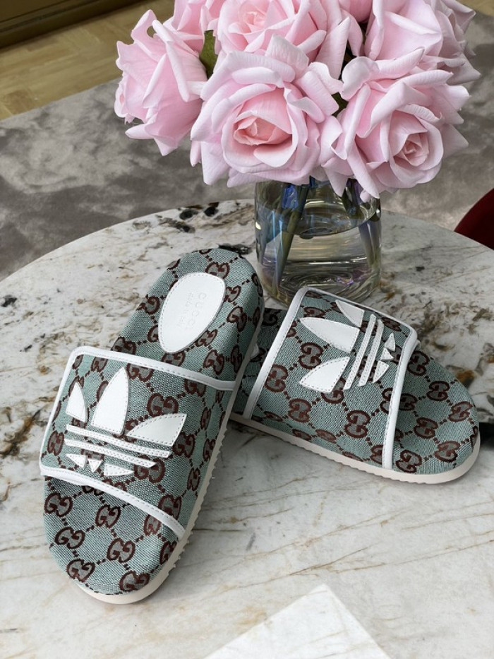 gu x a*d*das sandal