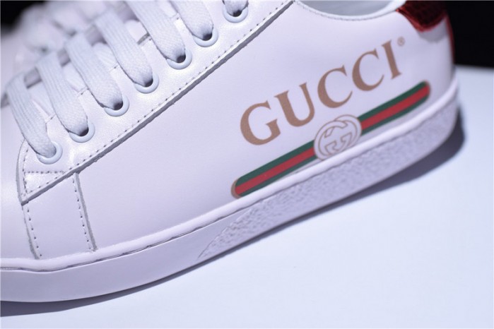 gu ace embroidered low-top sneaker with logo