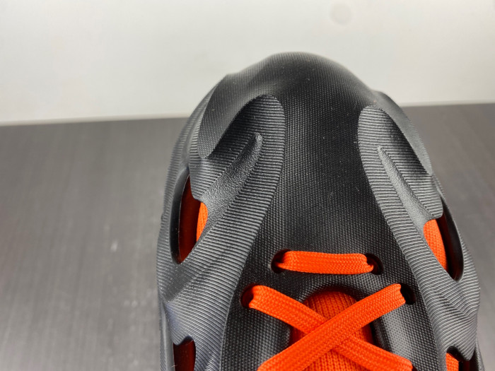 a*d*das adifom q core black impact orange hp6581