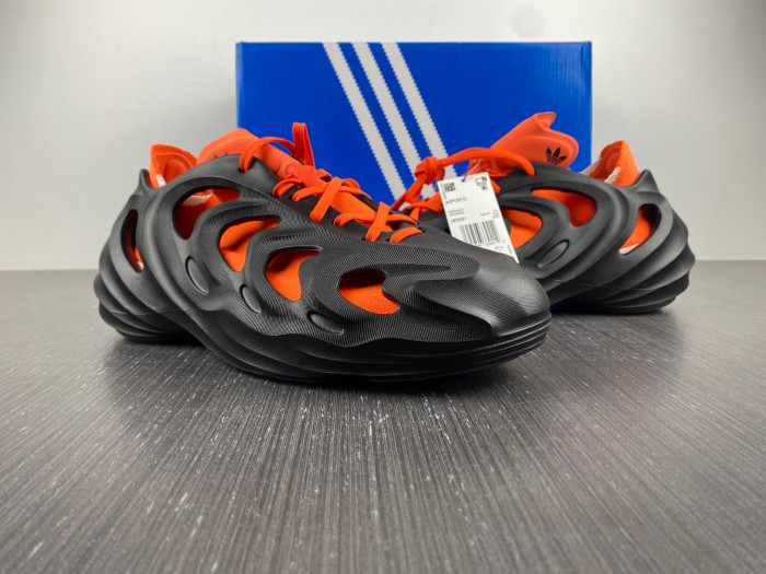a*d*das adifom q core black impact orange hp6581