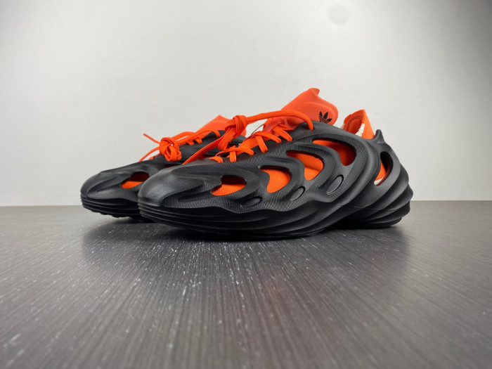 a*d*das adifom q core black impact orange hp6581