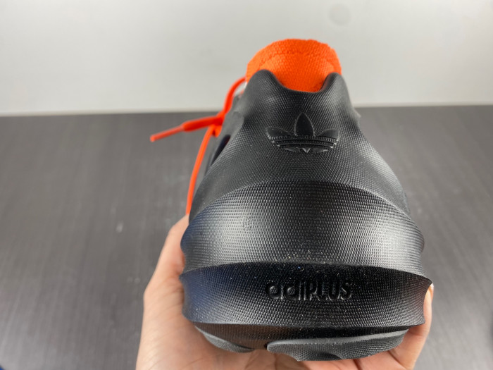 a*d*das adifom q core black impact orange hp6581